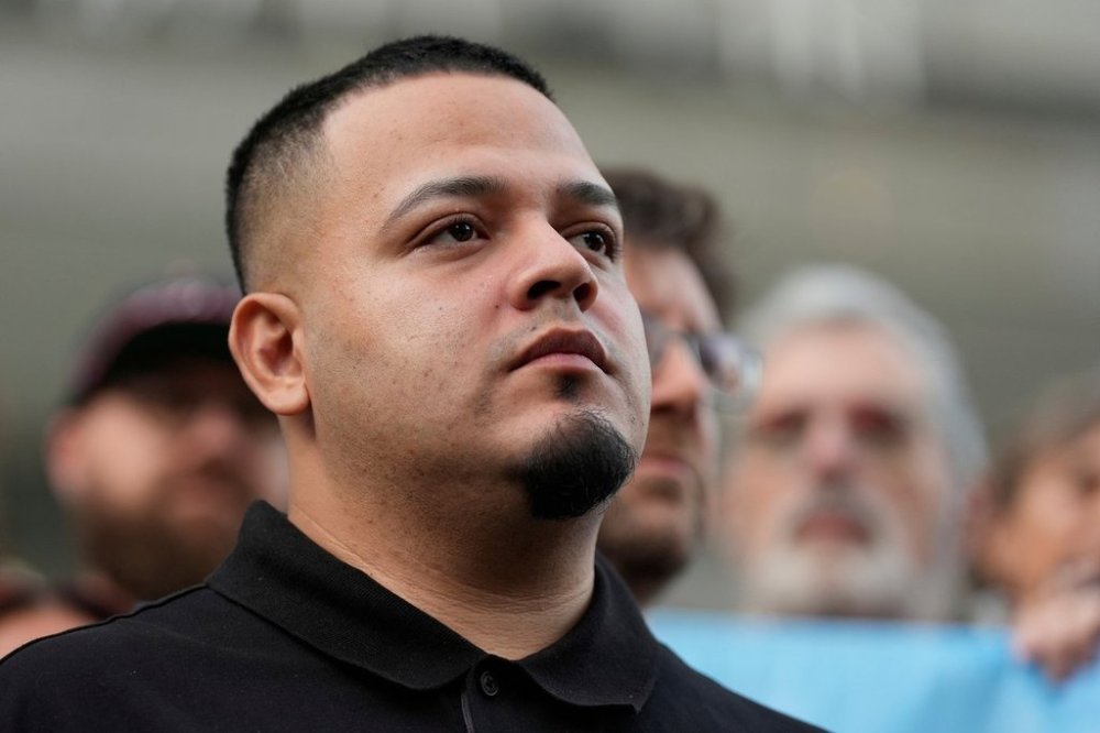 FILE - Kilmar Abrego Garcia attends a protest rally at the Immigration and Customs Enforcement field office in Baltimore, Aug. 25, 2025, to support Abrego Garcia. (AP Photo/Stephanie Scarbrough, File)
