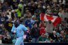 Toronto Blue Jays' Vladimir Guerrero Jr. rounds the bases after hitting a solo home run against the Seattle Mariners during the seventh inning in Game 4 of baseball's American League Championship Series, Thursday, Oct. 16, 2025, in Seattle. (AP Photo/Lindsey Wasson)