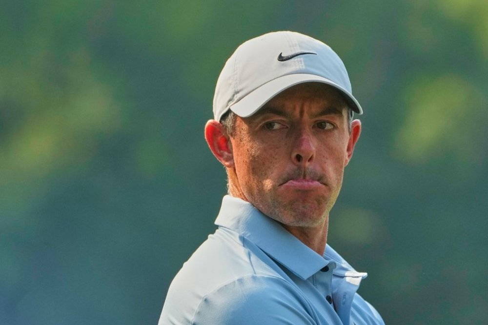 Rory McIlroy of Northern Ireland reacts during the DP World Tour Championship golf tournament in New Delhi, India, Thursday, Oct. 16, 2025. (AP Photo/Manish Swarup)