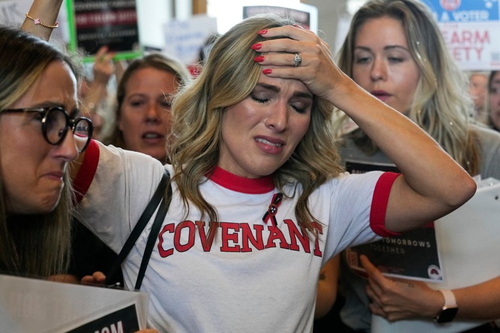 FILE - Covenant School parent Mary Joyce is overcome with emotion as she speaks outside the House chamber a special session of the state legislature on public safety adjourned, Aug. 29, 2023, in Nashville, Tenn. (AP Photo/George Walker IV, file)
