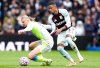 Manchester City's Erling Haaland (left) and Aston Villa's Ezri Konsa battle for the ball during the English Premier League match between Aston Villa and Manchester City, in Birmingham, England, Sunday Oct. 26, 2025. (Nick Potts/PA via AP)