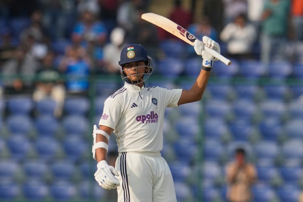 India's Yashasvi Jaiswal celebrates after scoring one hundred and fifty runs on the first day of the second cricket test match between India and West Indies at the Arun Jaitley Stadium in New Delhi, India, Friday, Oct.10, 2025. (AP Photo/Manish Swarup)