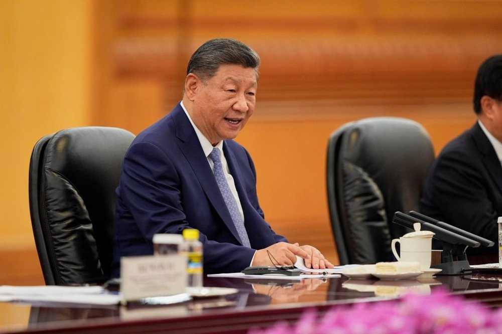 Chinese President Xi Jinping speaks during a meeting with Sri Lanka's Prime Minister Harini Amarasuriya at the Great Hall of the People in Beijing, China, Tuesday, Oct. 14, 2025. (Ichiro Banno/Pool Photo via AP)