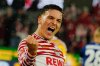 Cologne's Said El Mala celebrates after his team scored the 4th goal during the German Bundesliga soccer match between 1. FC Koeln and Hamburger SV in Cologne, Germany, Sunday, Nov. 2, 2025. (AP Photo/Martin Meissner)