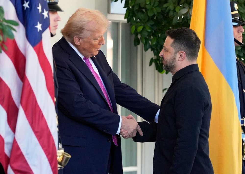 President Donald Trump, left, greets Ukraine's President Volodymyr Zelenskyy at the White House, Friday, Oct. 17, 2025, in Washington. (AP Photo/Alex Brandon)