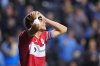 Chicago Fire's Jack Elliott reacts after missing a shot during a penalty shootout in Game 1 in the first round of MLS soccer's Eastern Conference playoffs against the Philadelphia Union, Sunday, Oct. 26, 2025, in Chester, Pa. (AP Photo/Derik Hamilton)