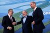 Brazil's President Luiz Inacio Lula da Silva, center, talks to Britain's Prime Minister Keir Starmer, left, and Britain's Prince William during the COP30 U.N. Climate Summit in Belem, Brazil, Thursday, Nov. 6, 2025. (AP Photo/Eraldo Peres)