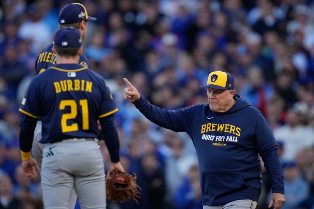 Milwaukee Brewers manager Pat Murphy takes starter Quinn Priester out of the game during the first inning of Game 3 of baseball's National League Division Series against the Chicago Cubs Wednesday, Oct. 8, 2025, in Chicago. (AP Photo/Erin Hooley)