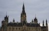 The Canadian flag flies on the roof of the West Block on Parliament Hill in Ottawa on Monday, Nov. 3, 2025. THE CANADIAN PRESS/Sean Kilpatrick