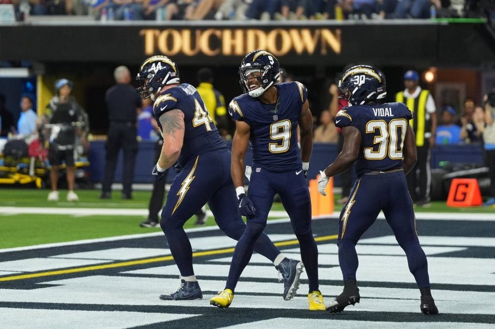 Los Angeles Chargers wide receiver Tre Harris (9) celebrates after scoring a touchdown during the second half of an NFL football game against the Minnesota Vikings Thursday, Oct. 23, 2025, in Inglewood, Calif. (AP Photo/Gregory Bull)