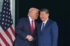 President Donald Trump, left, and Chinese President Xi Jinping, right, shake hands after their U.S.-China summit meeting at Gimhae International Airport Jinping in Busan, South Korea, Thursday, Oct. 30, 2025. (AP Photo/Mark Schiefelbein)