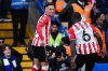 Sunderland's Chemsdine Talbi, left, celebrates scoring their side's second goal during the English Premier League soccer match between Chelsea and Sunderland at Stamford Bridge, London, Saturday Oct. 25, 2025. (John Walton/PA via AP)