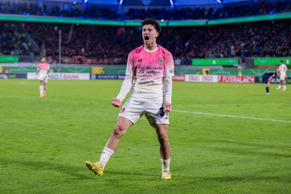 Leverkusen's Ibrahim Maza celebrates after scoring his side's third goal during a German soccer cup second round match between SC Paderborn and Bayer 04 Leverkusen in Paderborn, Germany, Wednesday, Oct. 29, 2025. (David Inderlied/dpa via AP)