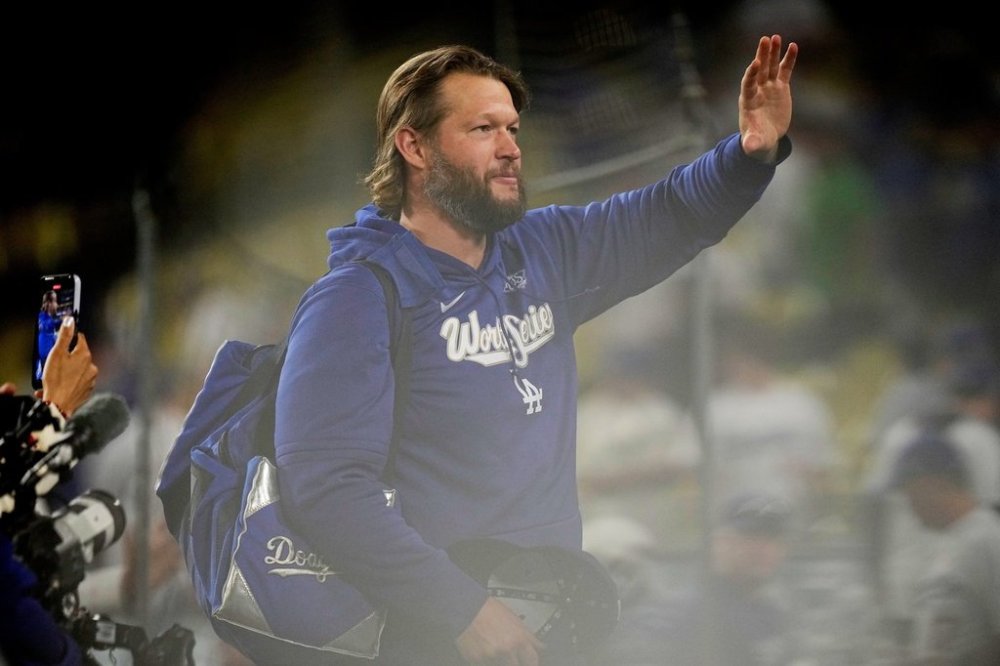 Los Angeles Dodgers pitcher Clayton Kershaw waves after their loss against the Toronto Blue Jays in Game 5 of baseball's World Series, Wednesday, Oct. 29, 2025, in Los Angeles. (AP Photo/Brynn Anderson)