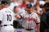 FILE - Atlanta Braves bench coach Walt Weiss, right, points to Colorado Rockies manager Bud Black before the first inning of a baseball game Aug. 9, 2024, in Denver. (AP Photo/David Zalubowski, File)