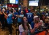 Toronto Blue Jays fans react after the team scored against the Seattle Mariners in Game 7 of the American League Championship Series, in Toronto, Monday, Oct. 20, 2025. THE CANADIAN PRESS/Laura Proctor