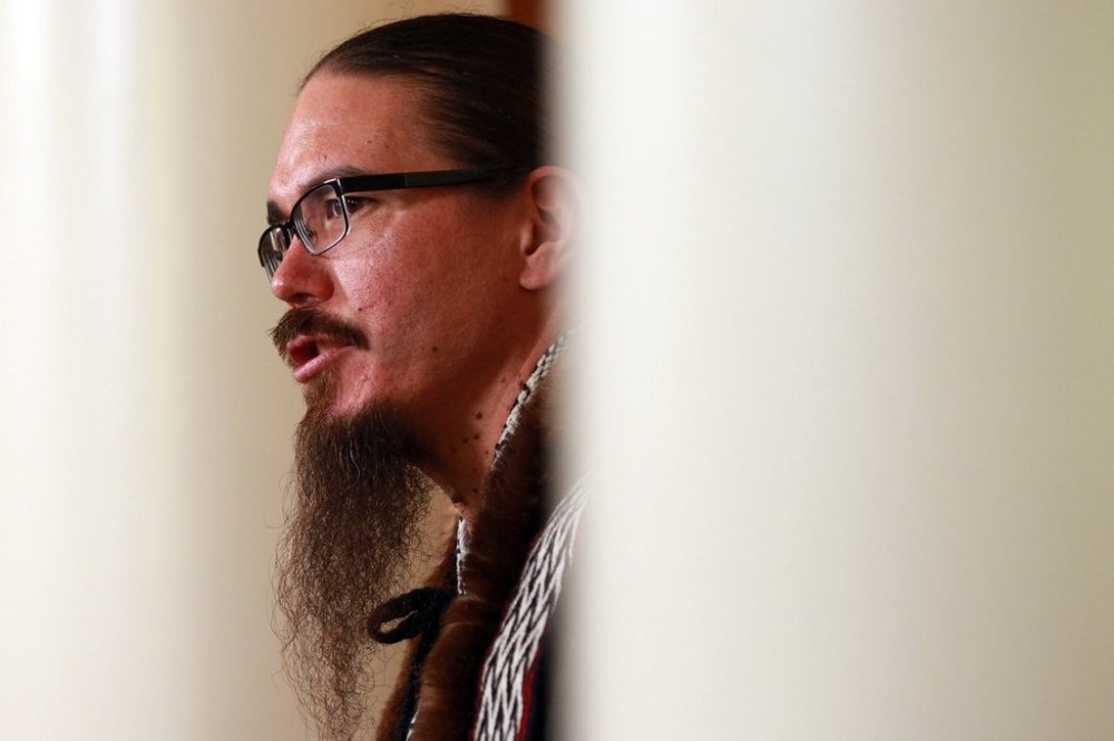 President of the Haida Nation Gaagwiis Jason Alsop speaks during an event to recognize the Haida Nation's Aboriginal title throughout Haida Gwaii during a ceremony in the Hall of Honour in the legislature, in Victoria, Monday, April 22, 2024. THE CANADIAN PRESS/Chad Hipolito