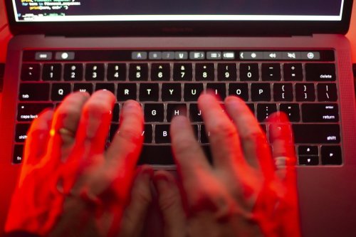 A man uses a computer keyboard in Toronto in a Sunday, Oct. 9, 2023 photo illustration. THE CANADIAN PRESS/Graeme Roy