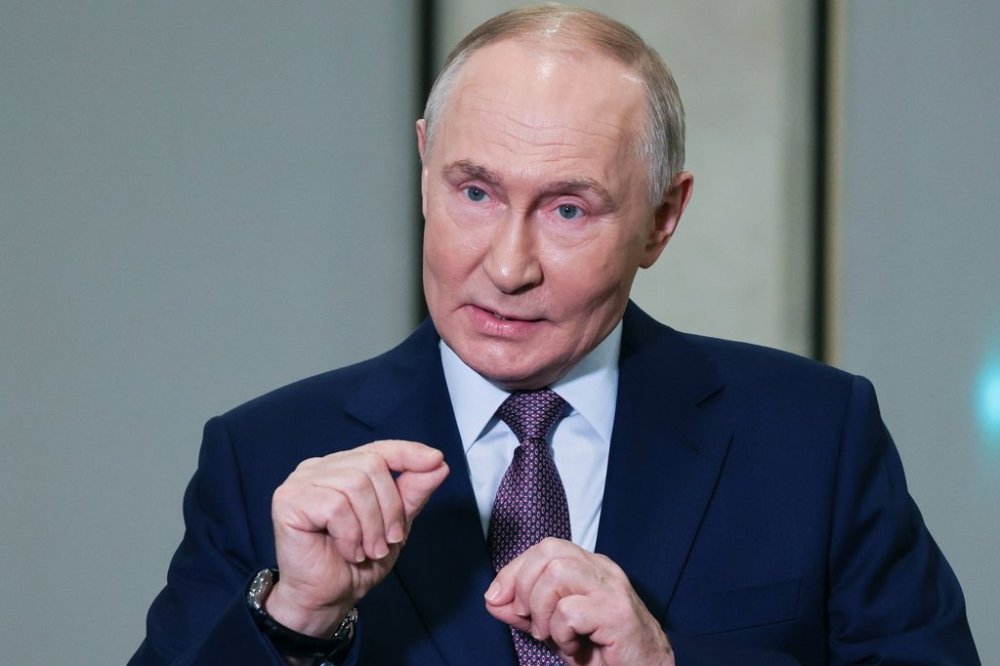 Russian President Vladimir Putin gestures while speaking to journalists on the sidelines of the Russian Geographical Society congress at the State Kremlin Palace in Moscow, Russia, Thursday, Oct. 23, 2025. (Vyacheslav Prokofyev, Sputnik, Kremlin Pool Photo via AP)