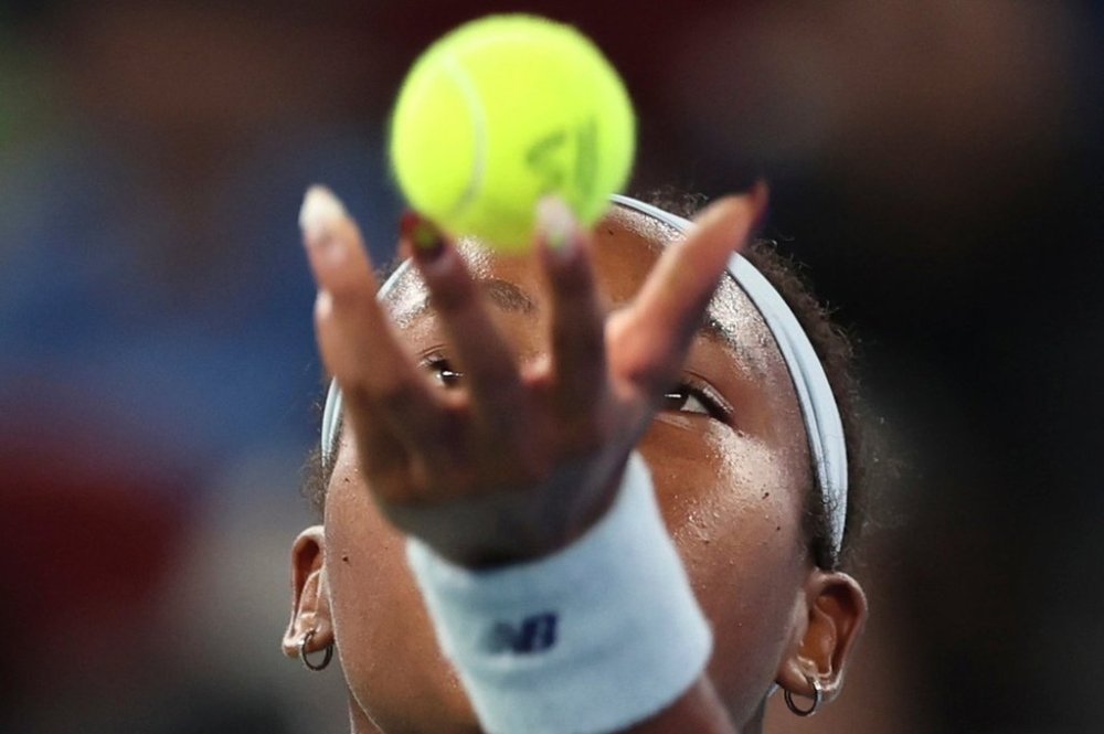 In this photo released by Xinhua News Agency, Coco Gauff of the United States serves during the women's singles final against compatriot Jessica Pegula at the 2025 Wuhan Open tennis tournament in Wuhan, central China's Hubei Province, Sunday, Oct. 12, 2025. (Bai Xuefei/Xinhua via AP)