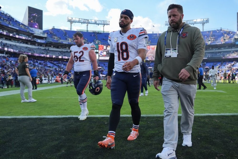 Chicago Bears quarterback Caleb Williams (18) leaves the field after a loss to the Baltimore Ravens in an NFL football game, Sunday, Oct. 26, 2025, in Baltimore. (AP Photo/Stephanie Scarbrough)
