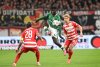 Bremen's Victor Boniface competes for the ball with Berlin's Christopher Trimmel, left, and Leopold Querfeld during the Bundesliga soccer match between FC Union Berlin, Matchday 8, at Weserstadion in Bremen, Germany, Friday Oct. 24, 2025. (Carmen Jaspersen/dpa via AP)