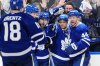Maple Leafs forward Max Domi (second right) celebrates his goal against the Florida Panthers with Steven Lorentz (left to right), Brandon Carlo, Scott Laughton and Morgan Rielly in Toronto on Wednesday, May 7, 2025. THE CANADIAN PRESS/Frank Gunn
