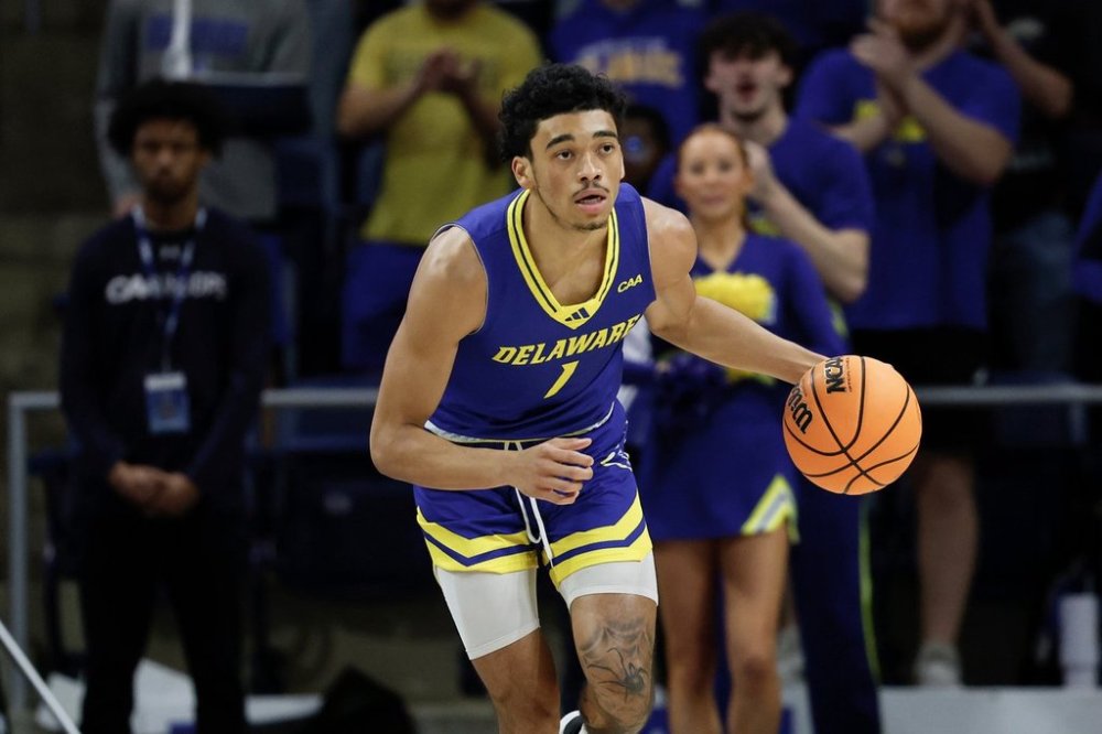 FILE - Delaware guard Izaiah Pasha (1) brings the ball up court during the first half of an NCAA college basketball game in the championship of the Coastal Athletic Association tournament against UNC Wilmington, Tuesday, March 11, 2025, in Washington. (AP Photo/Terrance Williams, File)