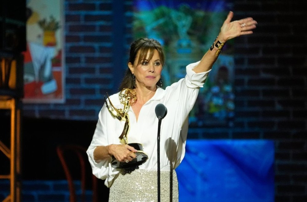 Nancy Lee Grahn waves to the audience after winning Outstanding Lead Actress in a Daytime Drama Series for