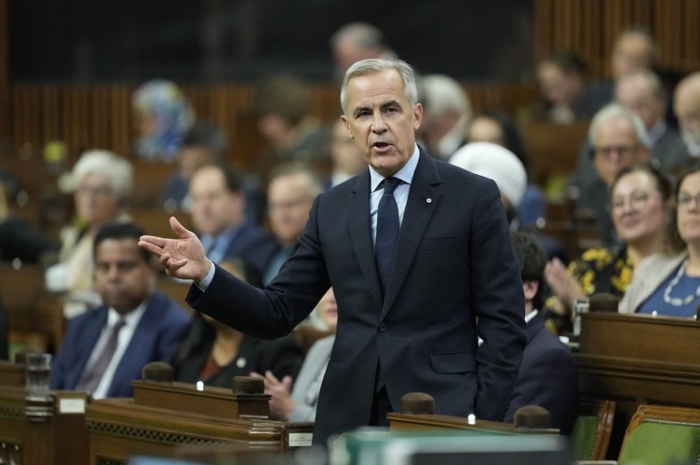 Prime Minister Mark Carney rises during question period on Parliament Hill in Ottawa, Thursday, Oct. 9, 2025. THE CANADIAN PRESS/Adrian Wyld