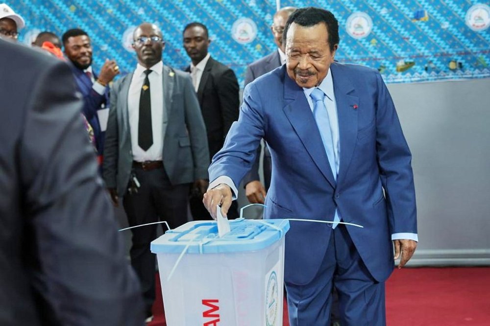 President Paul Biya casts his ballot at the Government Bilingual primary school Bastos in Yaounde, Cameroon, Saturday, Oct. 12, 2025 (AP Photo/Angel Ngwe)