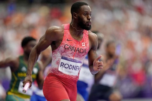 Canada's Brendon Rodney runs the baton in the men's 4 x 100m relay during the Paris Summer Olympics in Saint-Denis, France, Friday, Aug. 9, 2024. THE CANADIAN PRESS/Nathan Denette