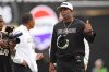 Colorado head coach Deion Sanders gestures to referees after a call against Iowa State in the second half of an NCAA college football game Saturday, Oct. 11, 2025, in Boulder, Colo. (AP Photo/David Zalubowski)