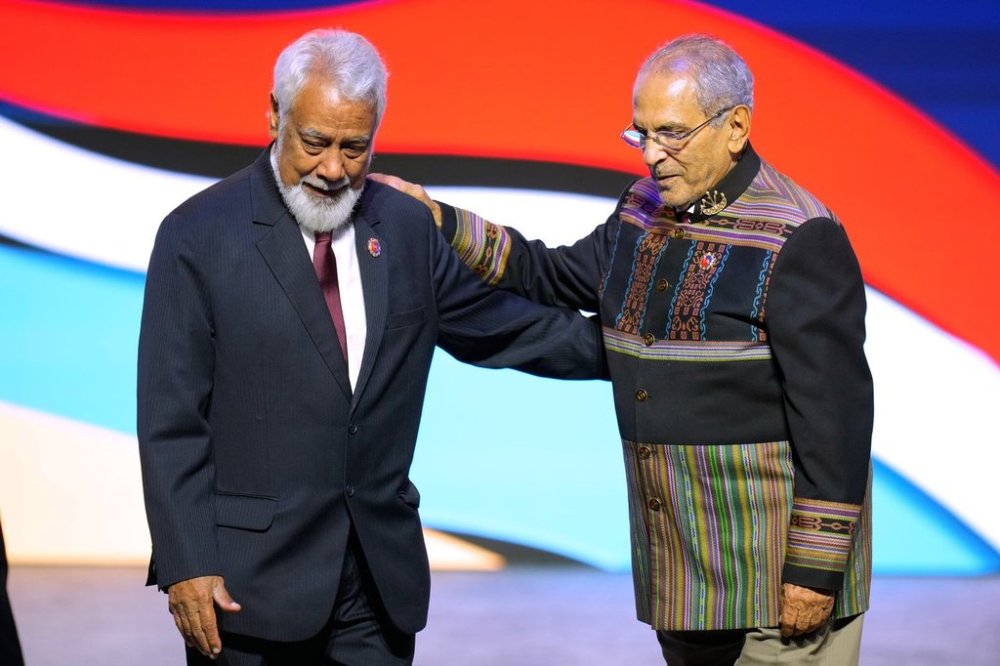 East Timor President Jose Ramos-Horta, right, and East Timor Prime Minister Kay Rala Xanana Gusmao pose for a photo during the signing ceremony of the Declaration on the Admission of East Timor into ASEAN at the 47th ASEAN summit, in Kuala Lumpur, Malaysia, Sunday, Oct. 26, 2025. (AP Photo/Vincent Thian)