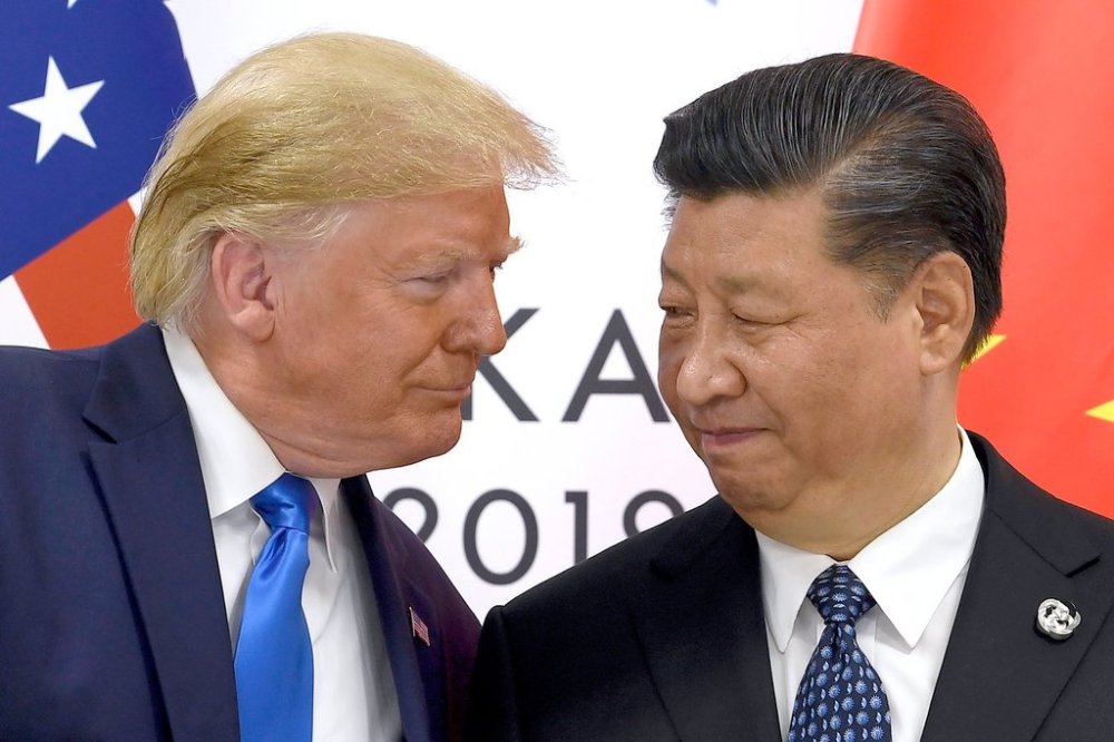 FILE - U.S. President Donald Trump, left, meets with Chinese President Xi Jinping during a meeting on the sidelines of the G-20 summit in Osaka, Japan, June 29, 2019. (AP Photo/Susan Walsh, File)