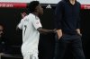 Real Madrid's Vinicius Junior complains to the becns as he is substituted during a La Liga soccer match between Real Madrid and Barcelona in Madrid, Spain, Sunday, Oct. 26, 2025. (AP Photo/Bernat Armangue)