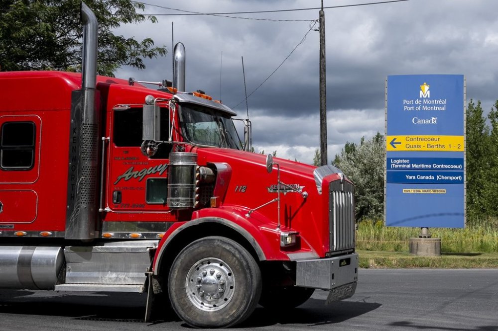 A transport truck leaves the Contrecoeur Marine Terminal in Contrecoeur, Que., on Tuesday, Aug. 26, 2025. THE CANADIAN PRESS/Christopher Katsarov