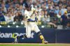 Milwaukee Brewers' Jackson Chourio hits a home run against the Los Angeles Dodgers during the first inning in Game 2 of baseball's National League Championship Series, Tuesday, Oct. 14, 2025, in Milwaukee. (AP Photo/Brynn Anderson)