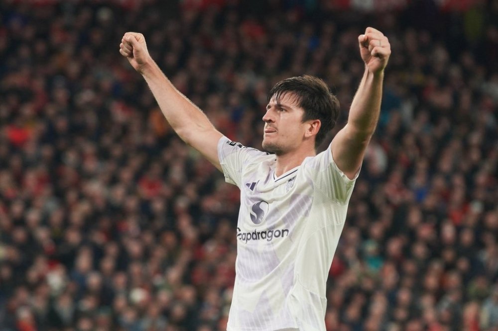 Manchester United's Harry Maguire celebrates after scoring his side's second goal during the English Premier League soccer match between Liverpool and Manchester United in Liverpool, England, Sunday, Oct. 19, 2025. (AP Photo/Ian Hodgson)