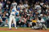 Los Angeles Dodgers' Shohei Ohtani celebrates his home run against the Milwaukee Brewers during the seventh inning in Game 4 of baseball's National League Championship Series, Friday, Oct. 17, 2025, in Los Angeles. (AP Photo/Mark J. Terrill)