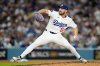 Los Angeles Dodgers pitcher Alex Vesia throws against the Milwaukee Brewers during the seventh inning in Game 4 of baseball's National League Championship Series, Friday, Oct. 17, 2025, in Los Angeles. (AP Photo/Brynn Anderson)