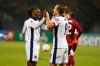 England's Eberechi Eze, left, celebrates with Harry Kane after scoring his side's fifth goal during the 2026 World Cup group K qualifying soccer match between Latvia and England in Riga, Latvia, Tuesday, Oct. 14, 2025. (AP Photo/Mindaugas Kulbis)