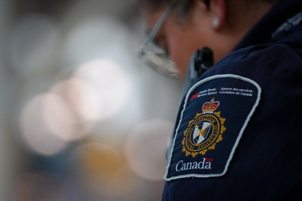 A Canada Border Services Agency patch is seen on the uniform of a CBSA officer at Vancouver International Airport, in Richmond, B.C., on Friday, Oct. 3, 2025. THE CANADIAN PRESS/Darryl Dyck