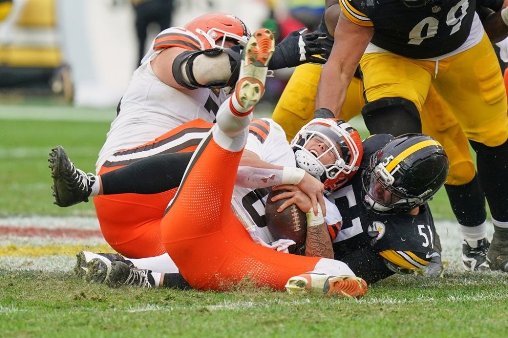 Pittsburgh Steelers linebacker Nick Herbig (51) sacks Cleveland Browns quarterback Dillon Gabriel (8) in the second half of an NFL football game in Pittsburgh, Sunday, Oct. 12, 2025. (AP Photo/Matt Freed)