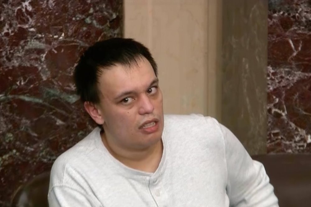 This image from Senate Television shows Christopher Moynihan sitting in the Senate Chamber at the U.S. Capitol in Washington, Jan. 6, 2021. (Senate Television via AP)