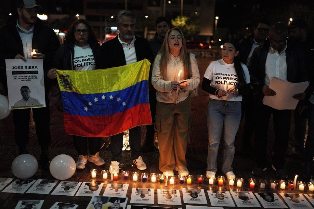 Venezuelans rally for the release of what they consider to be political prisoners and honor opposition leader Maria Corina Machado who was awarded the 2025 Nobel Peace Prize, in Bogota, Colombia, Saturday, Oct. 11, 2025. (AP Photo/Ivan Valencia)