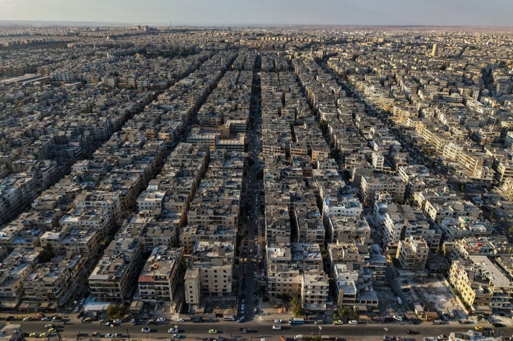 A general view shows the Sheikh Maqsoud neighborhood of Aleppo, Syria, Tuesday, Oct. 7, 2025. (AP Photo/Omar Albam)