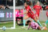 FILE - Kansas City Current goal keeper Adrianna Franch, bottom, and defender Taylor Leach (24) allow a goal by Angel City FC forward Christen Press during the second half of an NWSL soccer match in Los Angeles, May 21, 2022. (AP Photo/Ashley Landis, File)