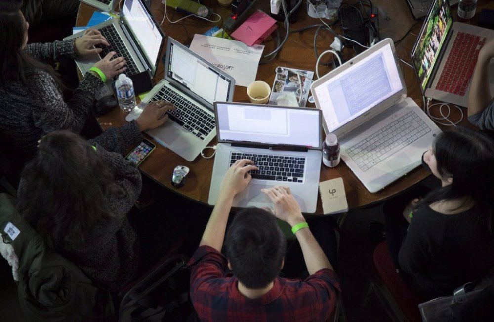 Participants take part in HTML500, a course teaching computer coding skills, in Vancouver, B.C., on Saturday, Jan. 24, 2015. THE CANADIAN PRESS/Jonathan Hayward