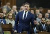 Conservative leader Pierre Poilievre rises during Question Period on Parliament Hill in Ottawa, Thursday, Oct. 9, 2025. THE CANADIAN PRESS/Adrian Wyld